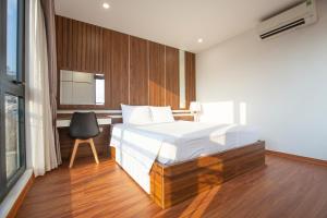 Katil atau katil-katil dalam bilik di Sumitomo Apartment - Linh Lang street