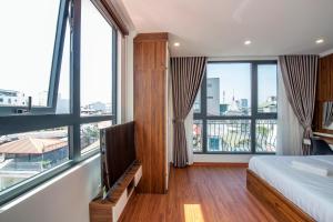 Televisyen dan/atau pusat hiburan di Sumitomo Apartment - Linh Lang street