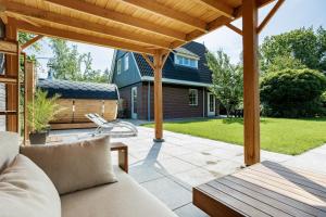 Κήπος έξω από το Vakantiepark De Kremmer