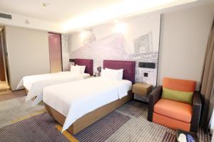 Letto o letti in una camera di Hampton by Hilton Guangzhou Zhujiang New Town - Free Shuttle Bus to Canton Fair