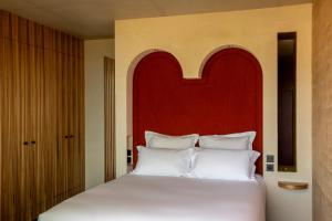 Postel nebo postele na pokoji v ubytování Hôtel Mylos - Cargèse