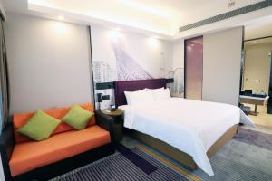 Letto o letti in una camera di Hampton by Hilton Guangzhou Zhujiang New Town - Free Shuttle Bus to Canton Fair