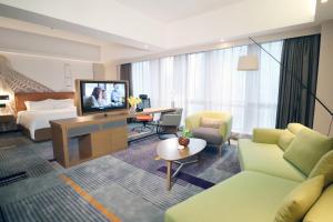 TV o dispositivi per l'intrattenimento presso Hampton by Hilton Guangzhou Zhujiang New Town - Free Shuttle Bus to Canton Fair