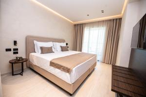 Postel nebo postele na pokoji v ubytování Safin Hotel & Spa + 106 fotografií