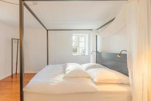 Katil atau katil-katil dalam bilik di Historic Villa In North Frisia