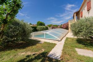 Bazén v ubytování Le Clos des Oliviers - Piscine Privée - Jardin - Parking nebo v jeho okolí