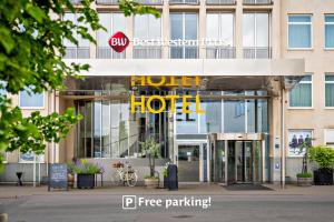 a hotel sign in front of a building at Best Western Plus Sthlm Bromma in Stockholm