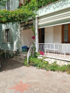 a house with a star painted on the side of it at Stella di Mare in Scarlino