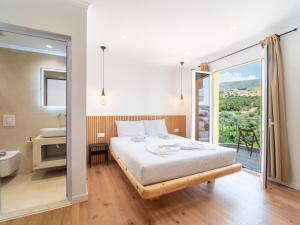 Postel nebo postele na pokoji v ubytování Orchard Retreat