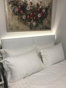 Ένα ή περισσότερα κρεβάτια σε δωμάτιο στο Kaldiona studio Larissa