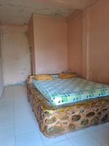 Postel nebo postele na pokoji v ubytování Wild Gibbon Guesthouse