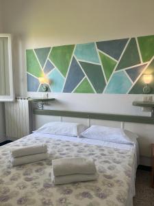 Postel nebo postele na pokoji v ubytování Hotel Splendor
