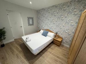 A bed or beds in a room at Pisazo en Pleno centro!!