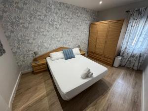 A bed or beds in a room at Pisazo en Pleno centro!!