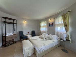 Postel nebo postele na pokoji v ubytování Pundin Khaoyai