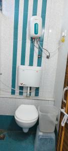 Un baño de Hotel Radhe