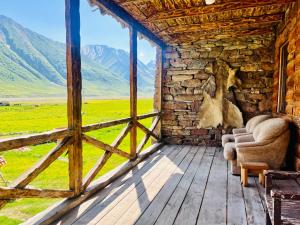 a room with a window with a view of mountains at Truso Guesthouse in Abano