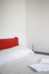 Postel nebo postele na pokoji v ubytování La Maison Jaune