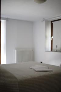 Postel nebo postele na pokoji v ubytování La Maison Jaune