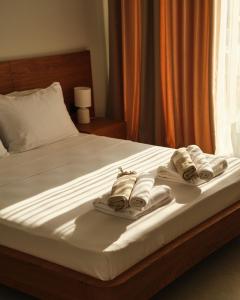 Ένα ή περισσότερα κρεβάτια σε δωμάτιο στο Ashta Suites - Villa Aura +46 φωτογραφίες