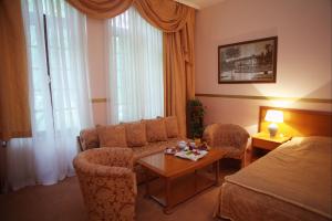 Katil atau katil-katil dalam bilik di Garni Hotel Park