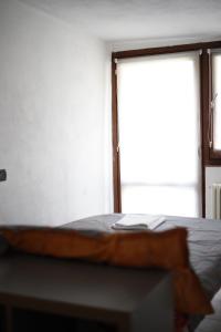 Postel nebo postele na pokoji v ubytování La Maison Jaune