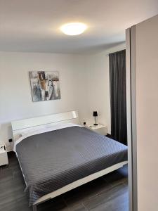 Katil atau katil-katil dalam bilik di Apartman Nikola +14 gambar