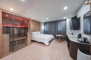 Hotel Palace Gyeongju客房内的一张或多张床位