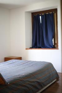 Postel nebo postele na pokoji v ubytování La Maison Jaune