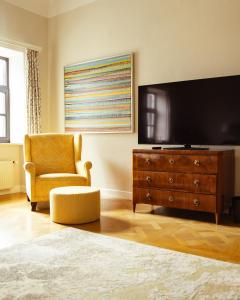 TV in/ali zabaviščno središče v nastanitvi Schlossberghotel