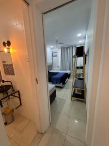 Cama ou camas em um quarto em Home Rio