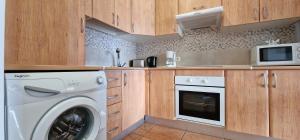 Kuchyň nebo kuchyňský kout v ubytování Aguamarina 430