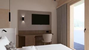 Postel nebo postele na pokoji v ubytování Hotel Neubergerhof