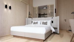 Postel nebo postele na pokoji v ubytování Hotel Neubergerhof