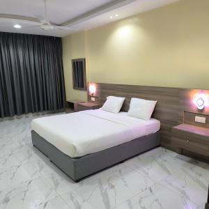 Katil atau katil-katil dalam bilik di Bin Slum hotel apartments