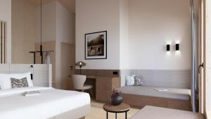 Postel nebo postele na pokoji v ubytování Hotel Neubergerhof