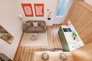 an overhead view of a living room with a couch at Castle District Design Studio in Budapest