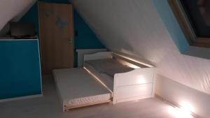 Postel nebo postele na pokoji v ubytování Ferienwohnung Mit Großer Dachterrasse + 9 fotografií