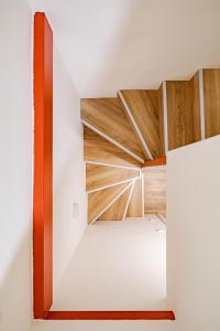 a room with white walls and wood dividers at Castle District Design Studio in Budapest +36 photos