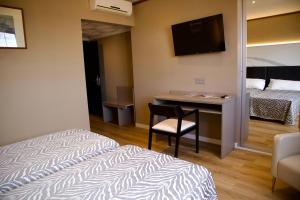Postel nebo postele na pokoji v ubytování Hotel Benetusser