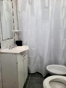 Koupelna v ubytování Zurita Apart + 9 fotografií