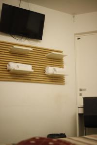 TV a/nebo společenská místnost v ubytování SMILE ACCOMODATION AOSTA