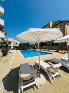 Bazén v ubytování Green Paradise apartments nebo v jeho okolí