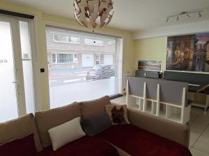 Kuchyň nebo kuchyňský kout v ubytování Gelijkvloers appartement in hartje Oostende