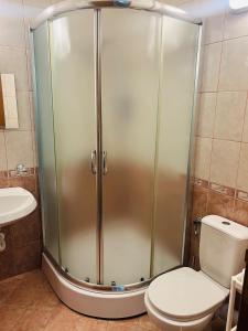 Koupelna v ubytování Green Paradise apartments + 2 fotografie