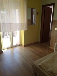 Postel nebo postele na pokoji v ubytování Hotel Garden