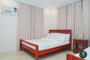 Ένα ή περισσότερα κρεβάτια σε δωμάτιο στο Modern Tropical 2BR Villa Pool Retreat in Amadeo +57 φωτογραφίες