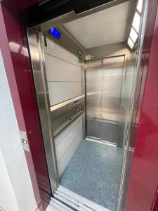 an elevator in a building with the door open at Medeea's Spanish Sunny Escape in Vinarós