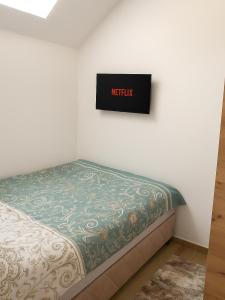 Apartman Sunce1客房内的一张或多张床位