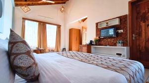 KK Jungle View Resort客房内的一张或多张床位